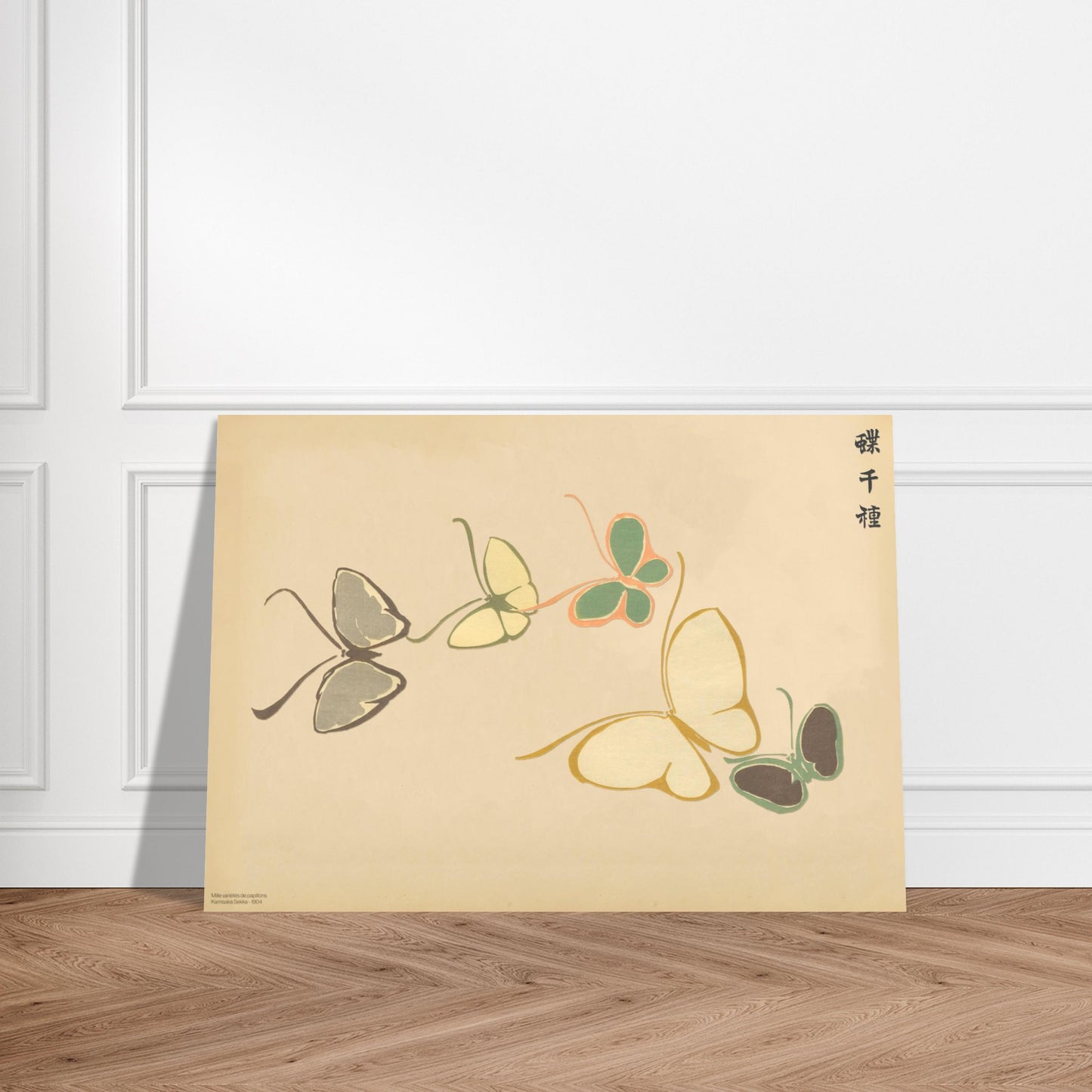 Estampe de papillons stylisés aux tons pastel - Kamisaka Sekka. Gravure japonaise de papillons stylisés aux aplats pastel de vert, rose et jaune, avec des accents brunâtres, sur un fond crème, par Kamisaka Sekka. Image d'illustration 3