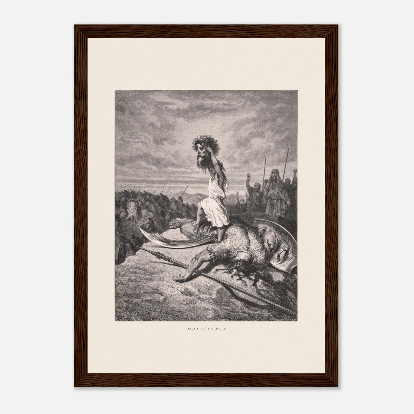 David et Goliath : gravure ancienne de Gustave Doré (1866) (21x29,7 cm (A4) / Cadre bois foncé). Gravure de Gustave Doré représentant David debout sur le corps de Goliath, tenant sa tête.
