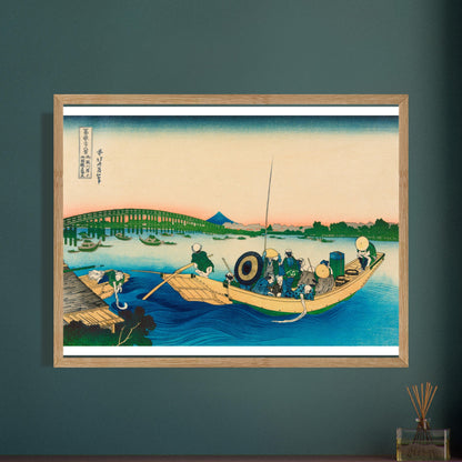 Gravure ukiyo-e Coucher de soleil à Onmayagashi - Katsushika Hokusai. Estampe ukiyo-e de Katsushika Hokusai représentant un coucher de soleil sur une rivière, avec un pont vert en arrière-plan et des silhouettes de bateaux. Image d'illustration 9