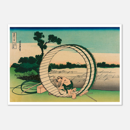 Estampe Le Fuji vu de la province d’Owari - Katsushika Hokusai (42x59,4 cm (A2)). Reproduction ukiyo-e représentant un homme travaillant sur une roue à aubes près d'un moulin, avec le Mont Fuji visible au loin.