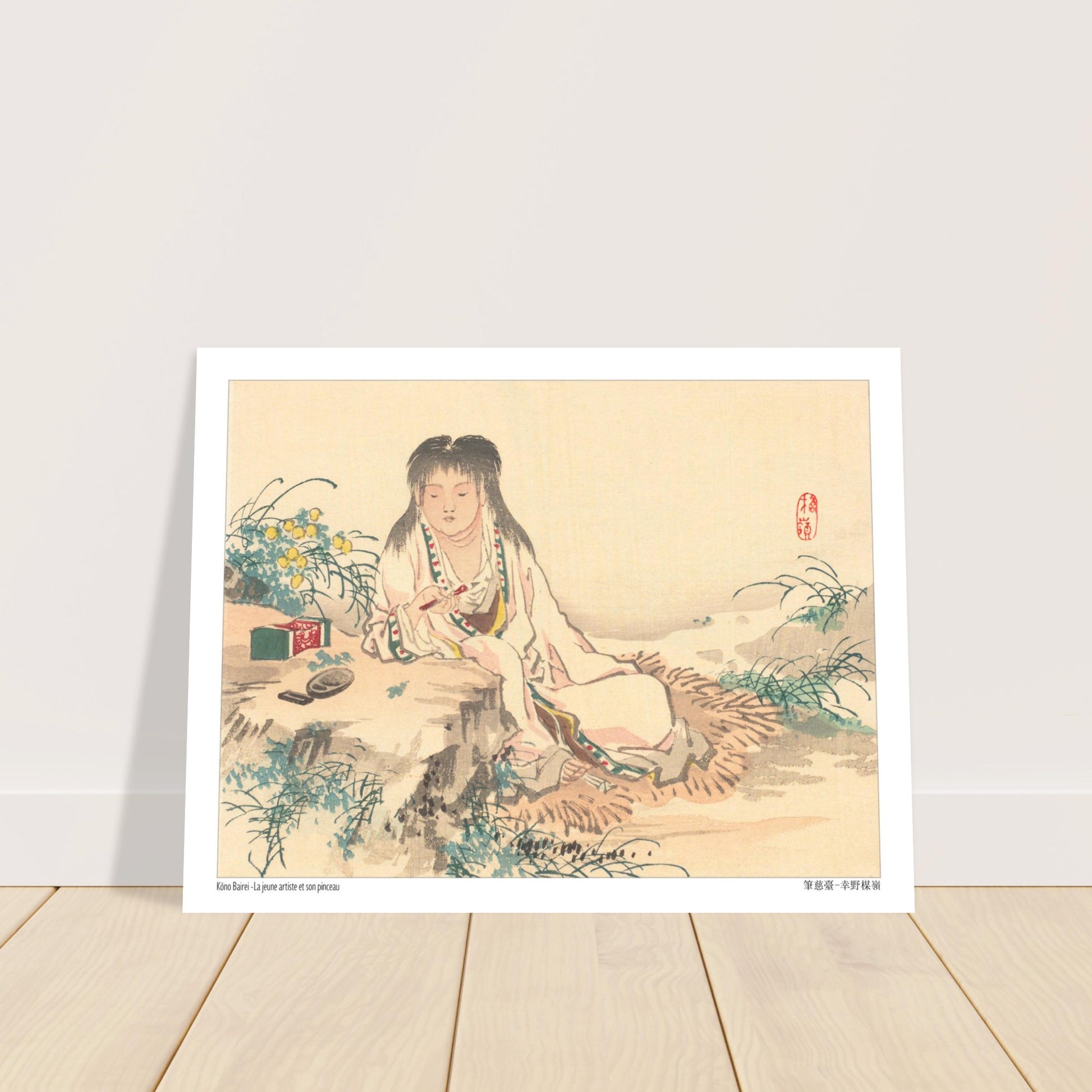 Estampe Japonaise d'une Jeune Artiste au Pinceau, par Kōno Bairei. Estampe japonaise d'une jeune femme aux longs cheveux noirs, assise et tenant un pinceau, avec des fleurs jaunes et un écrin vert sur le côté. Image d'illustration 6