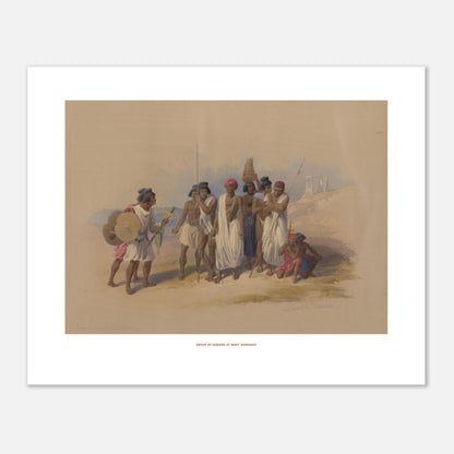 Groupe de Nubiens à Wadi Kardassy — Illustration de David Roberts (40x50 cm). Lithographie ancienne montrant un groupe de Nubiens à Wadi Kardassy, certains portant des lances et un bouclier, dans un paysage désertique.