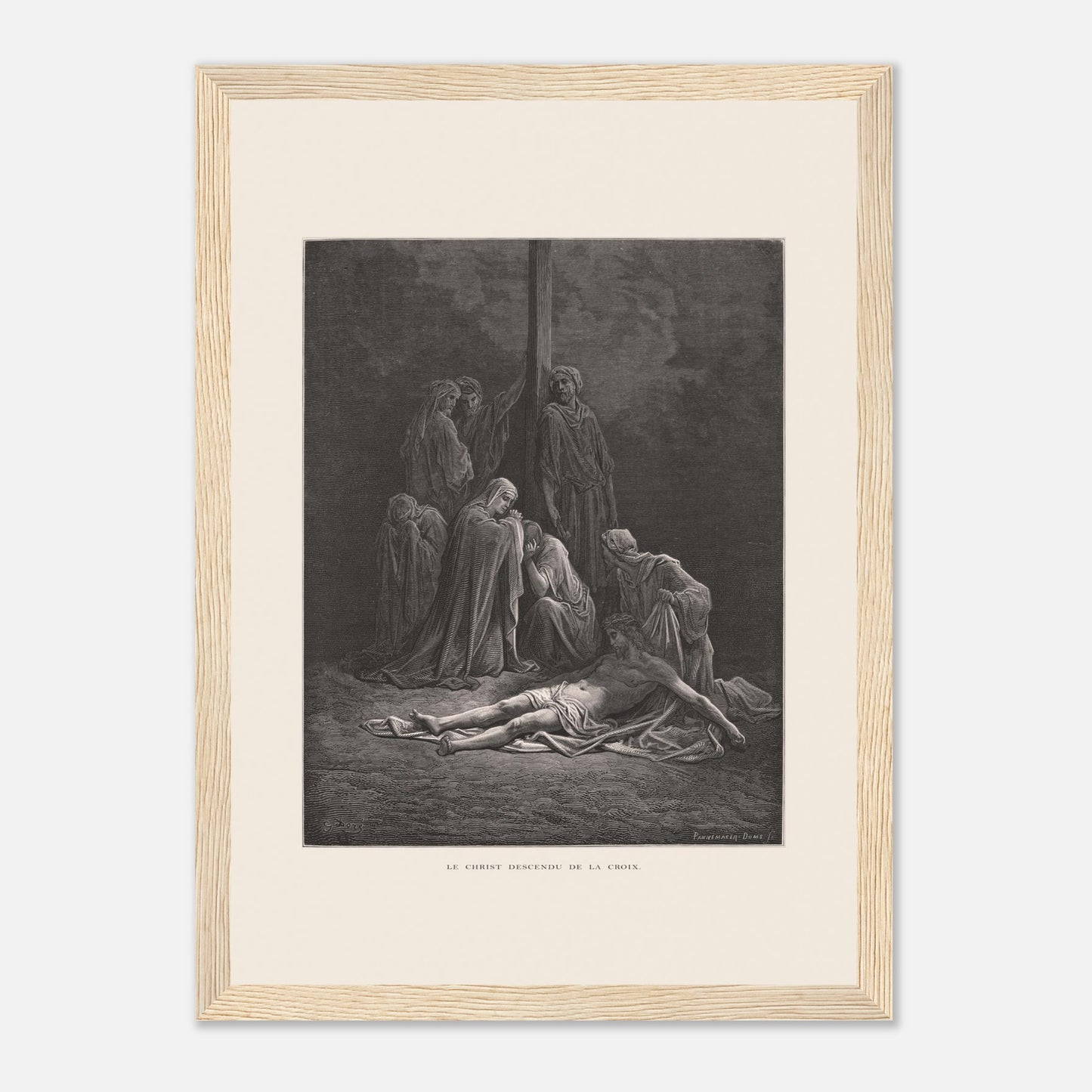 Le Christ descendu de la croix – Gravure de Gustave Doré (21x29,7 cm (A4) / Cadre bois clair). Gravure de Gustave Doré montrant le Christ descendu de la croix, entouré de figures endeuillées.