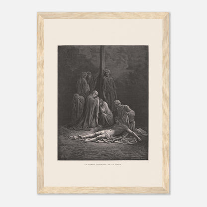 Le Christ descendu de la croix – Gravure de Gustave Doré (21x29,7 cm (A4) / Cadre bois clair). Gravure de Gustave Doré montrant le Christ descendu de la croix, entouré de figures endeuillées.