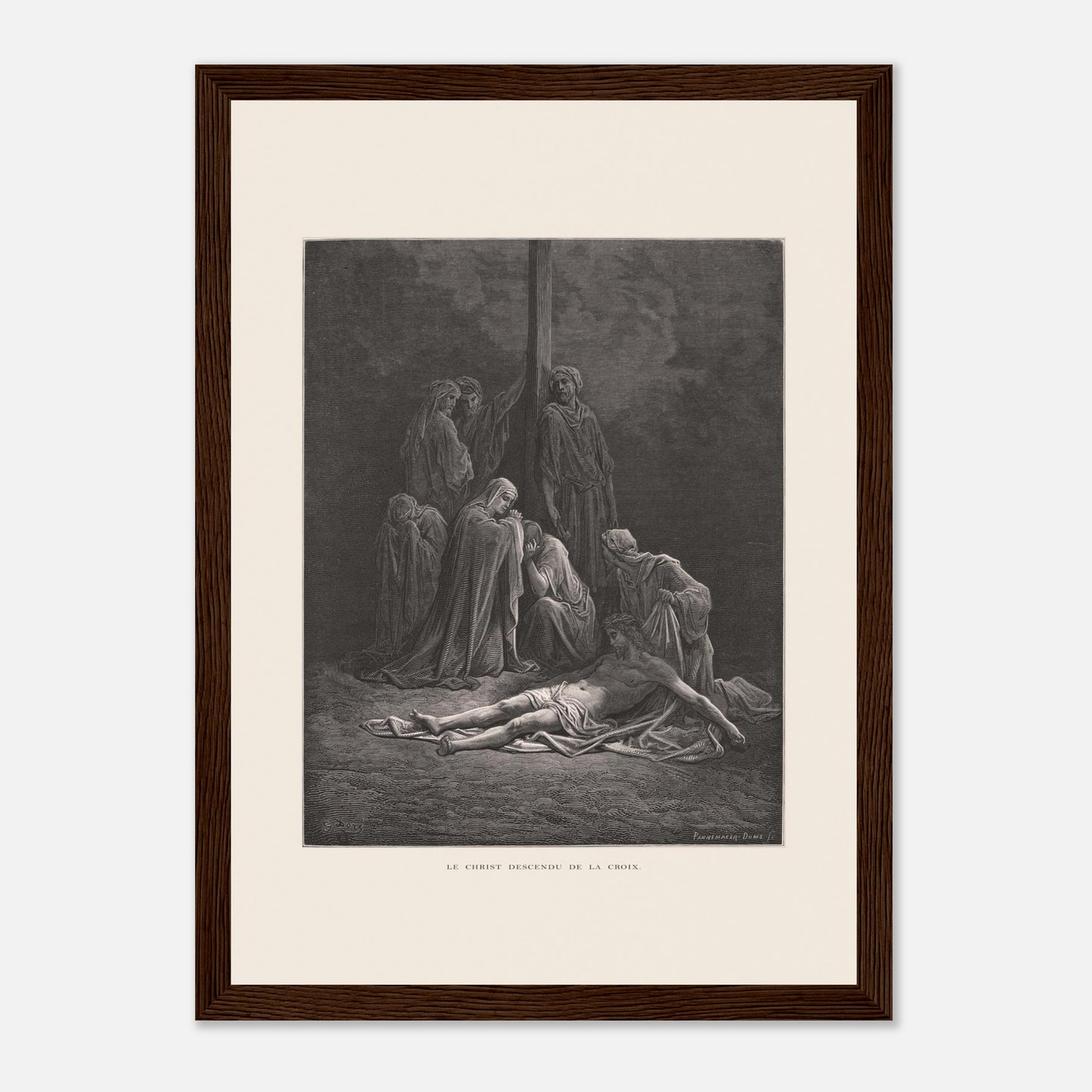 Le Christ descendu de la croix – Gravure de Gustave Doré (21x29,7 cm (A4) / Cadre bois foncé). Gravure de Gustave Doré montrant le Christ descendu de la croix, entouré de figures endeuillées.