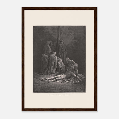 Le Christ descendu de la croix – Gravure de Gustave Doré (29,7x42 cm (A3) / Cadre bois foncé). Gravure de Gustave Doré montrant le Christ descendu de la croix, entouré de figures endeuillées.