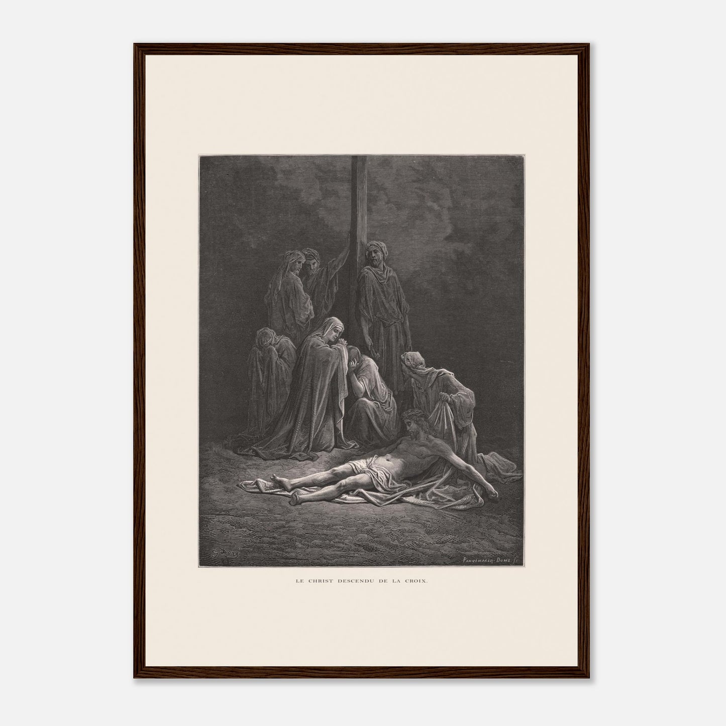 Le Christ descendu de la croix – Gravure de Gustave Doré (42x59,4 cm (A2) / Cadre bois foncé). Gravure de Gustave Doré montrant le Christ descendu de la croix, entouré de figures endeuillées.