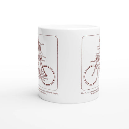 Mug blanc illustré d'une planche anatomique vintage de squelette à bicyclette. Mug blanc orné d'une illustration scientifique ancienne de couleur rouge bordeaux montrant un squelette humain pédalant sur un vélo, avec les noms des os du corps humain annotés en français.