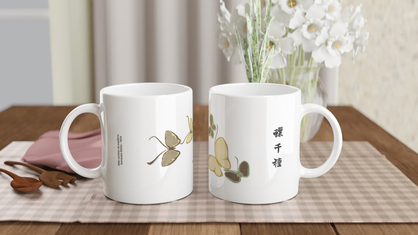 Mug décoré de papillons pastels par Kamisaka Sekka. Planche de papillons stylisés en aplats pastels et doux, extraite du recueil "Mille variétés de papillons" de Kamisaka Sekka. Image d'illustration 2