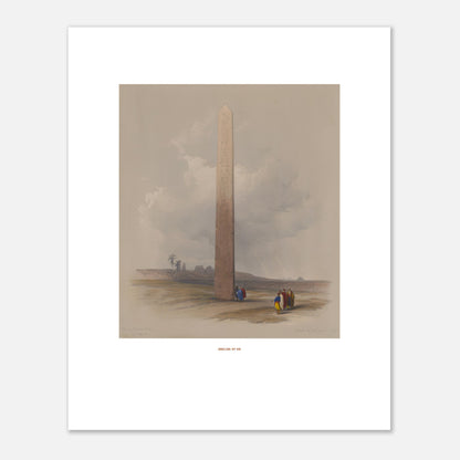 Gravure ancienne : L'Obélisque d'Héliopolis en Égypte, David Roberts (40x50 cm). Lithographie ancienne montrant l'Obélisque d'Héliopolis entouré de ruines et de quelques personnages, avec une palmeraie au loin.