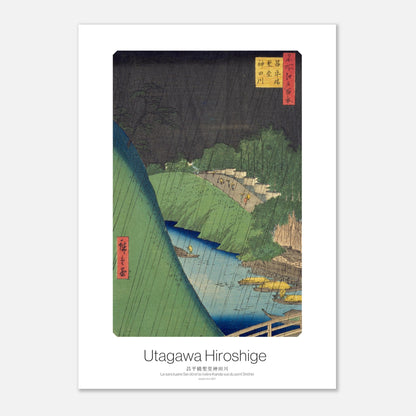 Gravure japonaise : Le sanctuaire Sei-dō et la rivière Kanda, Hiroshige (29,7x42 cm (A3)). Gravure ukiyo-e de Hiroshige représentant le sanctuaire Sei-dō et la rivière Kanda sous une forte pluie, avec des personnages portant des parapluies.