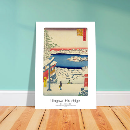 Planche ukiyo-e : Le sanctuaire Yushima Tenjin sous la neige, Hiroshige. Gravure ukiyo-e de Hiroshige représentant le sanctuaire Yushima Tenjin couvert de neige, avec une vue sur un lac et des toits enneigés. Image d'illustration 4