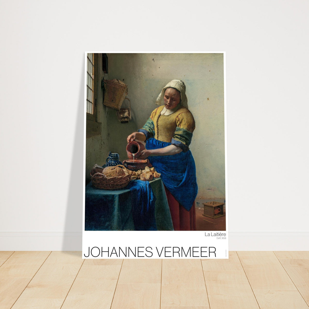 La Lattaia, illustrazione del capolavoro di Johannes Vermeer. Lattaia di Johannes Vermeer, che raffigura una donna che versa del latte in una ciotola su un tavolo imbandito con del pane.