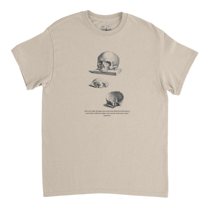 T-shirt anatomie trois crânes humains - William Cheselden (Sable). T-shirt noir avec une illustration de trois crânes humains en différentes vues, dessinés en blanc.